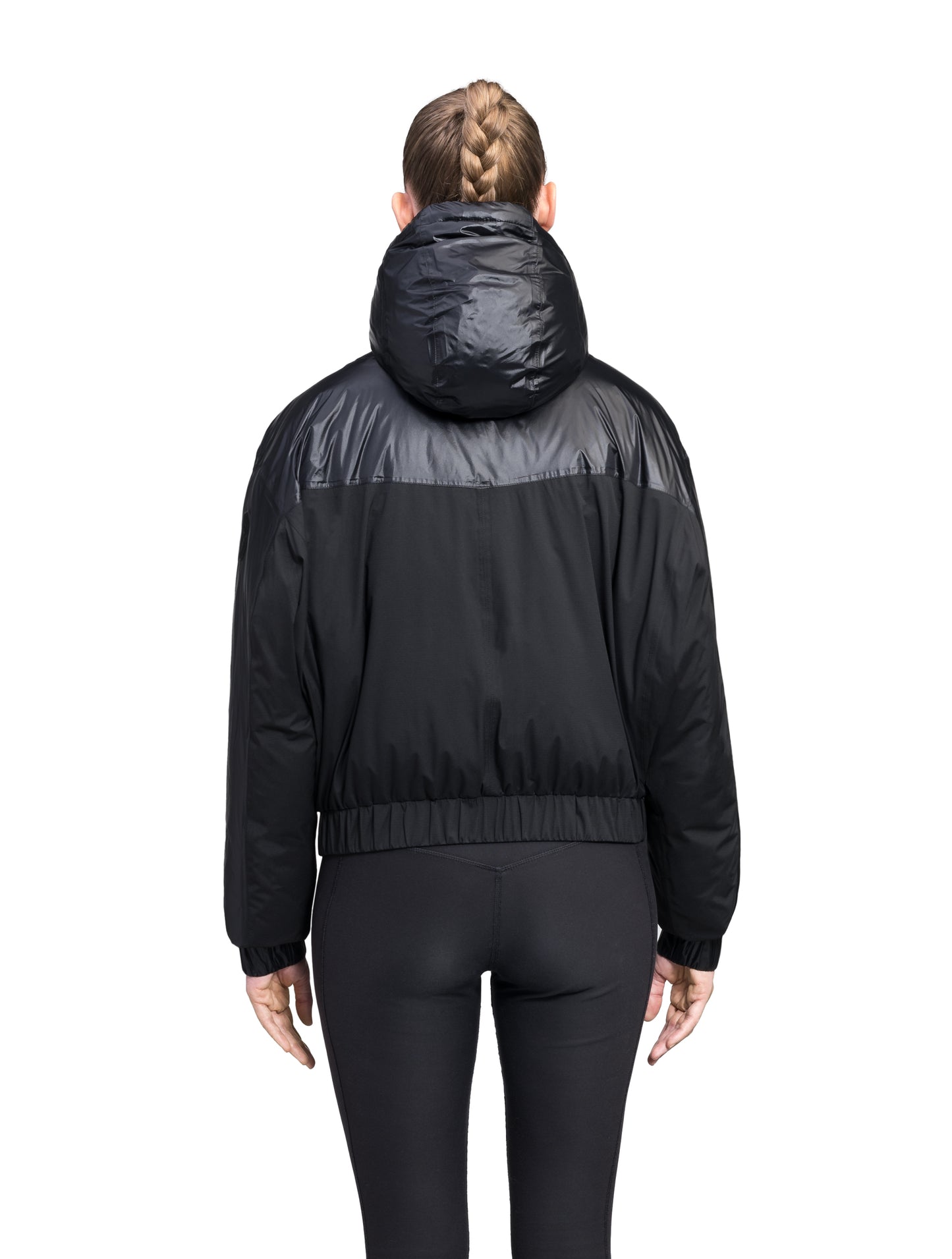 Aspen Women's Batwing Jacket in hip length, premium stretch ripstop and cire technical nylon taffeta fabrication, Premium Canadian White Duck Down insulation, non-removable down-filled hood, centre front two-way zipper, winged arm detailing, in Black