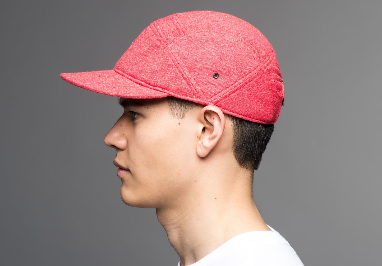 Unisex camp hat with metal plate branding on crown side in H. Red