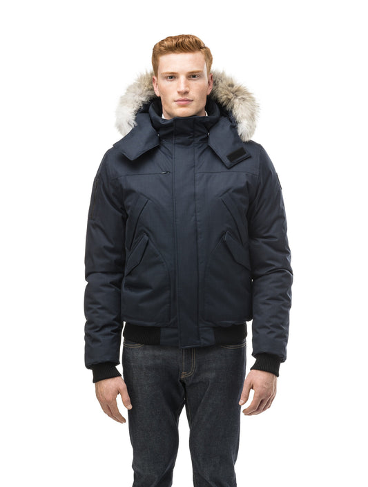 Men's classic down filled bomber jacket with a down filledÃƒÆ’Ã†â€™Ãƒâ€ Ã¢â‚¬â„¢ÃƒÆ’Ã¢â‚¬Â ÃƒÂ¢Ã¢â€šÂ¬Ã¢â€žÂ¢ÃƒÆ’Ã†â€™Ãƒâ€šÃ‚Â¢ÃƒÆ’Ã‚Â¢ÃƒÂ¢Ã¢â€šÂ¬Ã…Â¡Ãƒâ€šÃ‚Â¬ÃƒÆ’Ã¢â‚¬Â¦Ãƒâ€šÃ‚Â¡ÃƒÆ’Ã†â€™Ãƒâ€ Ã¢â‚¬â„¢ÃƒÆ’Ã‚Â¢ÃƒÂ¢Ã¢â‚¬Å¡Ã‚Â¬Ãƒâ€¦Ã‚Â¡ÃƒÆ’Ã†â€™ÃƒÂ¢Ã¢â€šÂ¬Ã…Â¡ÃƒÆ’Ã¢â‚¬Å¡Ãƒâ€šÃ‚Â hood that features a removable coyote fur trim and concealed moldable framing wire in Navy + Navy