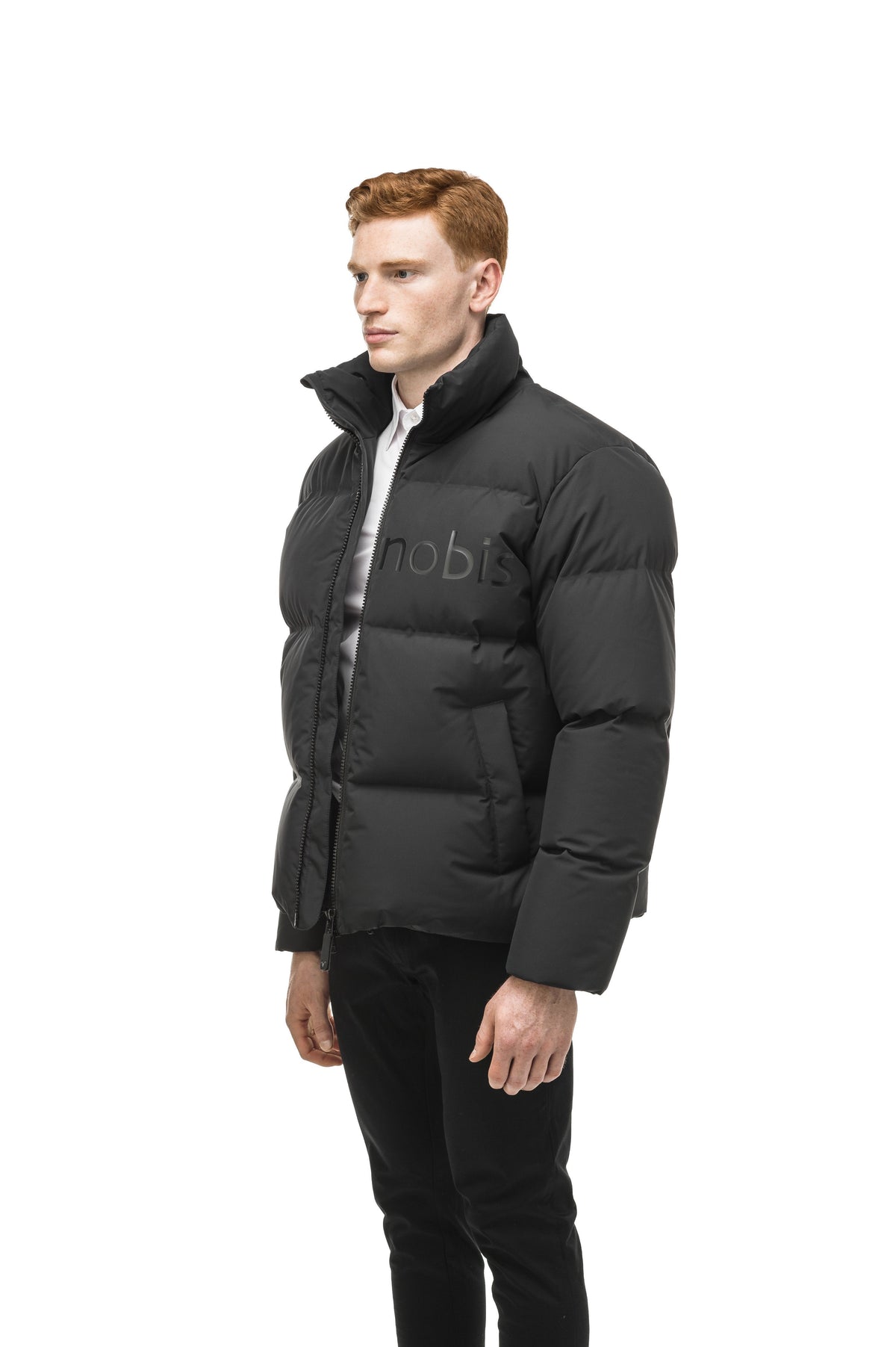 Men's puffer jacket with a minimalist modern design; featuring graphic details like oversized tonal branding, an exposed zipper, and seamless puffer channels in Black