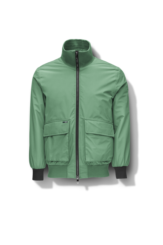 Flint Men's Tailored Rib Collar Jacket in hip length, premium 3-ply Micro Denier fabrication, premium 4-way stretch, water resistant Primaloft Gold Insulation Active +, flap pockets with magnetic closure at waist, side entry pockets at waist, ribbed sleeve cuffs, two-way branded zipper at centre front, box pleat detailing at centre back, large interior zipper pocket, and interior button pocket at left chest, in Comfrey + Comfrey