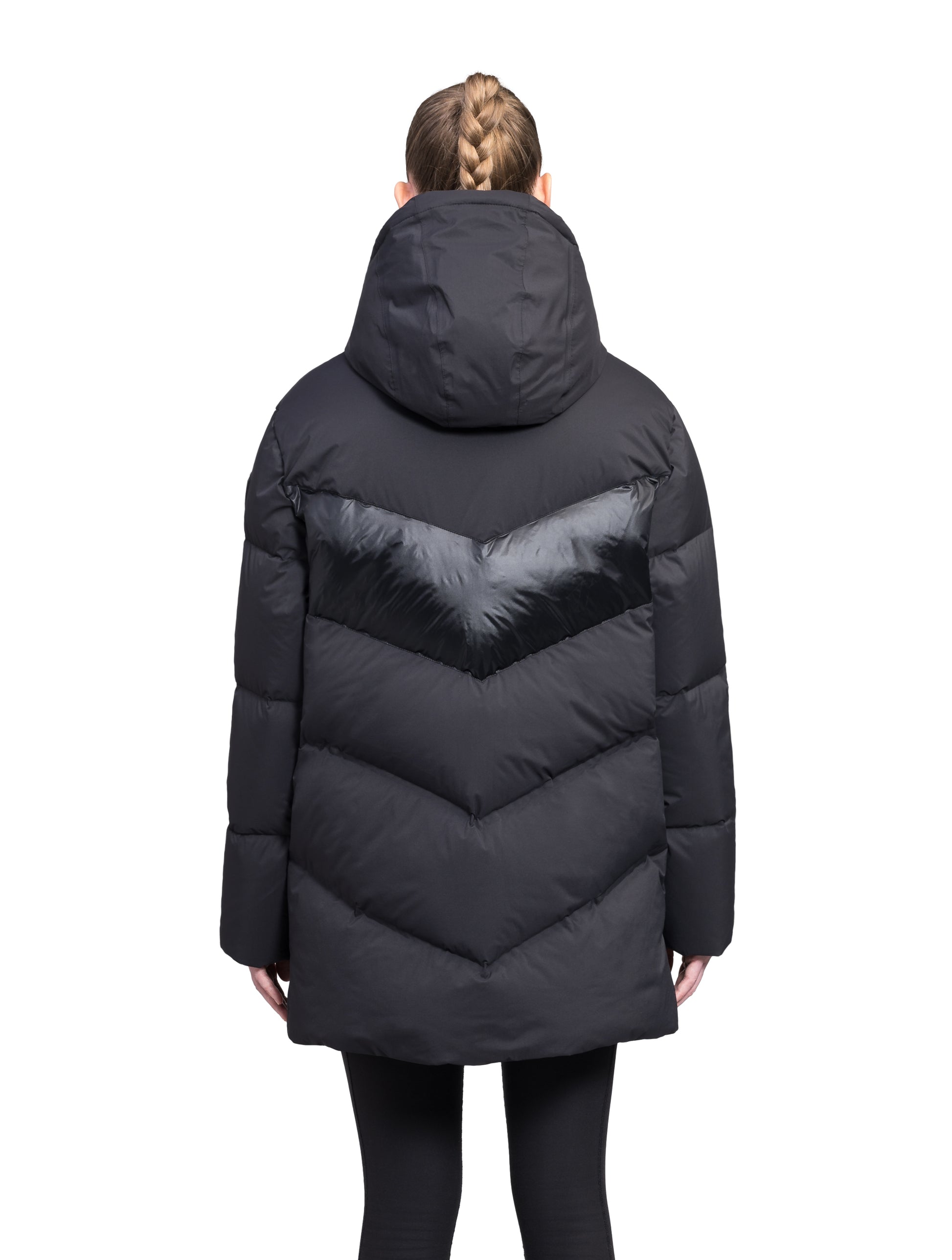 Isla Women's Chevron Quilted Puffer Jacket in thigh length, premium technical nylon taffeta fabrication, Premium Canadian origin White Duck Down insulation, non-removable down-filled hood, two-way centre-front zipper, zipper pockets at waist, contrast cire technical nylon taffeta detailing on chest and back, in Black