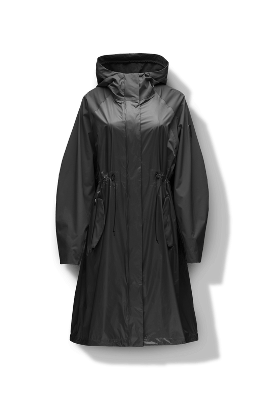 Reyna Women's Tailored Packable Long Shell Jacket in knee length, premium strech ripstop and contrast cire technical nylon taffeta fabrication, non-removable hood with adjustable draw cord, waist flap pockets with magnetic closures, adjustable draw cords at waist and bottom hem, adjustable snap cuffs, mesh back ventilation, hidden packable pocket, snap button wind flap, two-way branded zipper at centre front, adjustable snap button fishtail yoke at back, and large interior zipper pocket, in Black + Black