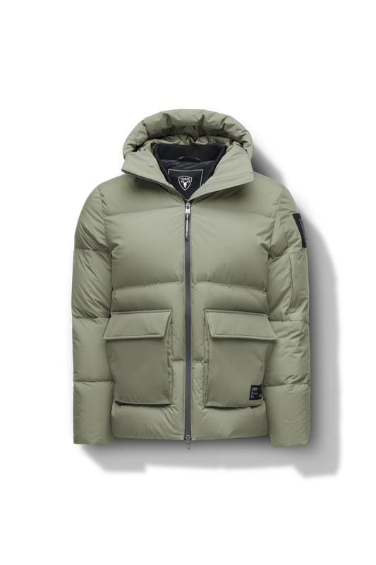 Supra Men's Performance Puffer in hip length, Technical Taffeta and 3-Ply Micro Denier fabrication, Premium Canadian White Duck Down insulation, non-removable down filled hood, centre front two-way zipper, flap pockets at waist, and zipper pocket at left bicep, in Clover + Clover