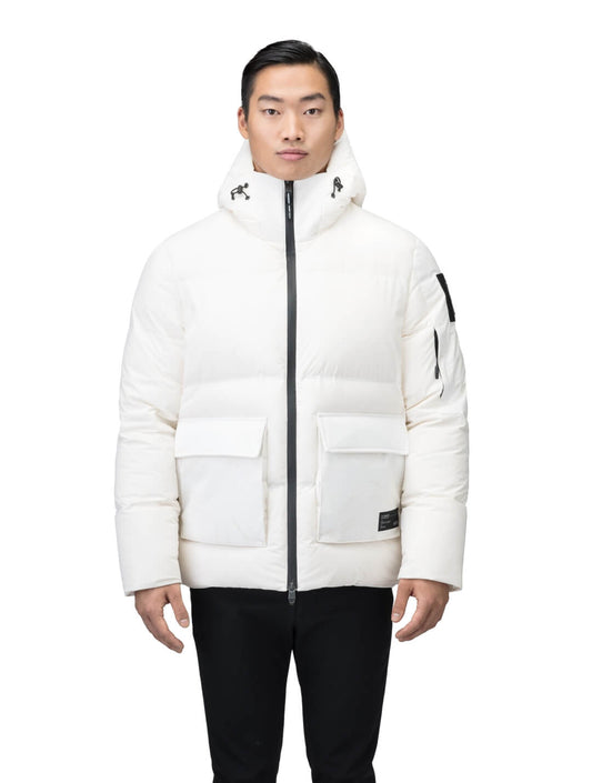 Supra Men's Performance Puffer in hip length, Technical Taffeta and 3-Ply Micro Denier fabrication, Premium Canadian White Duck Down insulation, non-removable down filled hood, centre front two-way zipper, flap pockets at waist, and zipper pocket at left bicep, in Wheat Desert + Wheat Desert