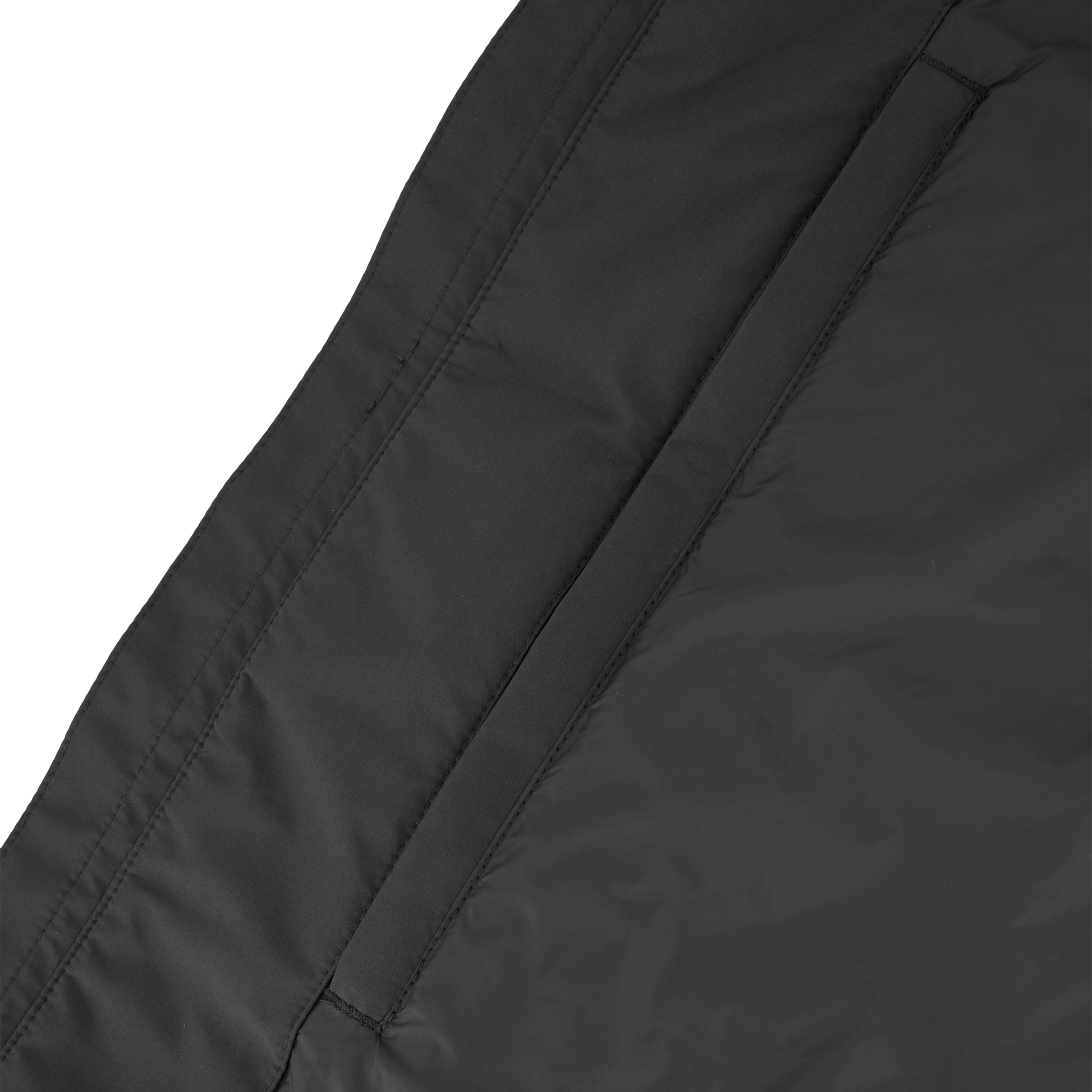 Upton long jacket in Black in 3-ply Micro Denier fabric with DWR coating, featuring a two-way zipper with magnetic closure, hidden mesh ventilation, and underarm vents. Designed for weather protection and tailored comfort.