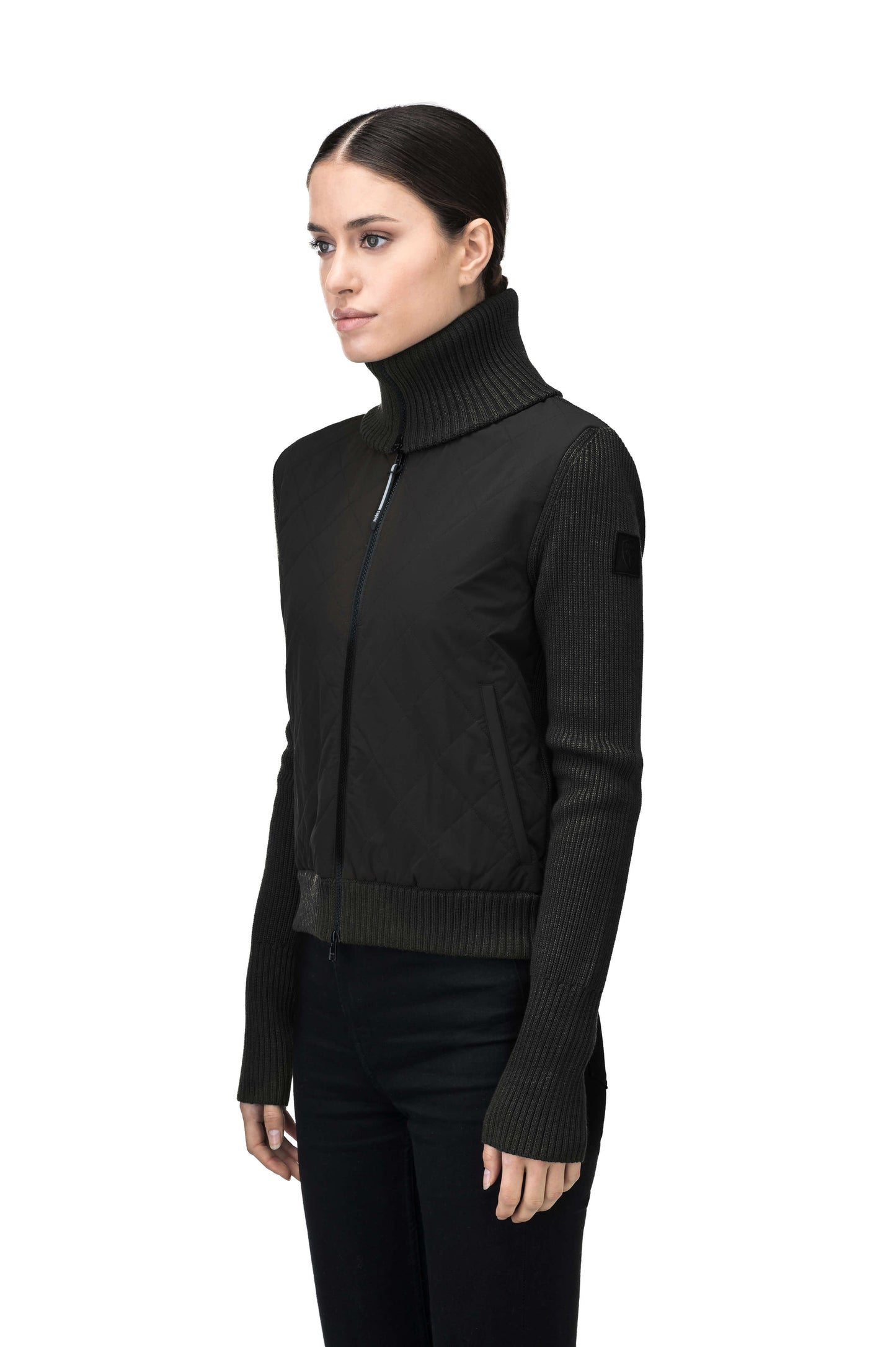 Ada Ladies Quilted Full Zip Sweater in hip length, PrimaLoft Gold Insulation Active+, Durable 4-Way Stretch Weave quilted torso, Merino wool knit collar, sleeves, back, and cuffs, two-way front zipper, and hidden waist pockets, in Black