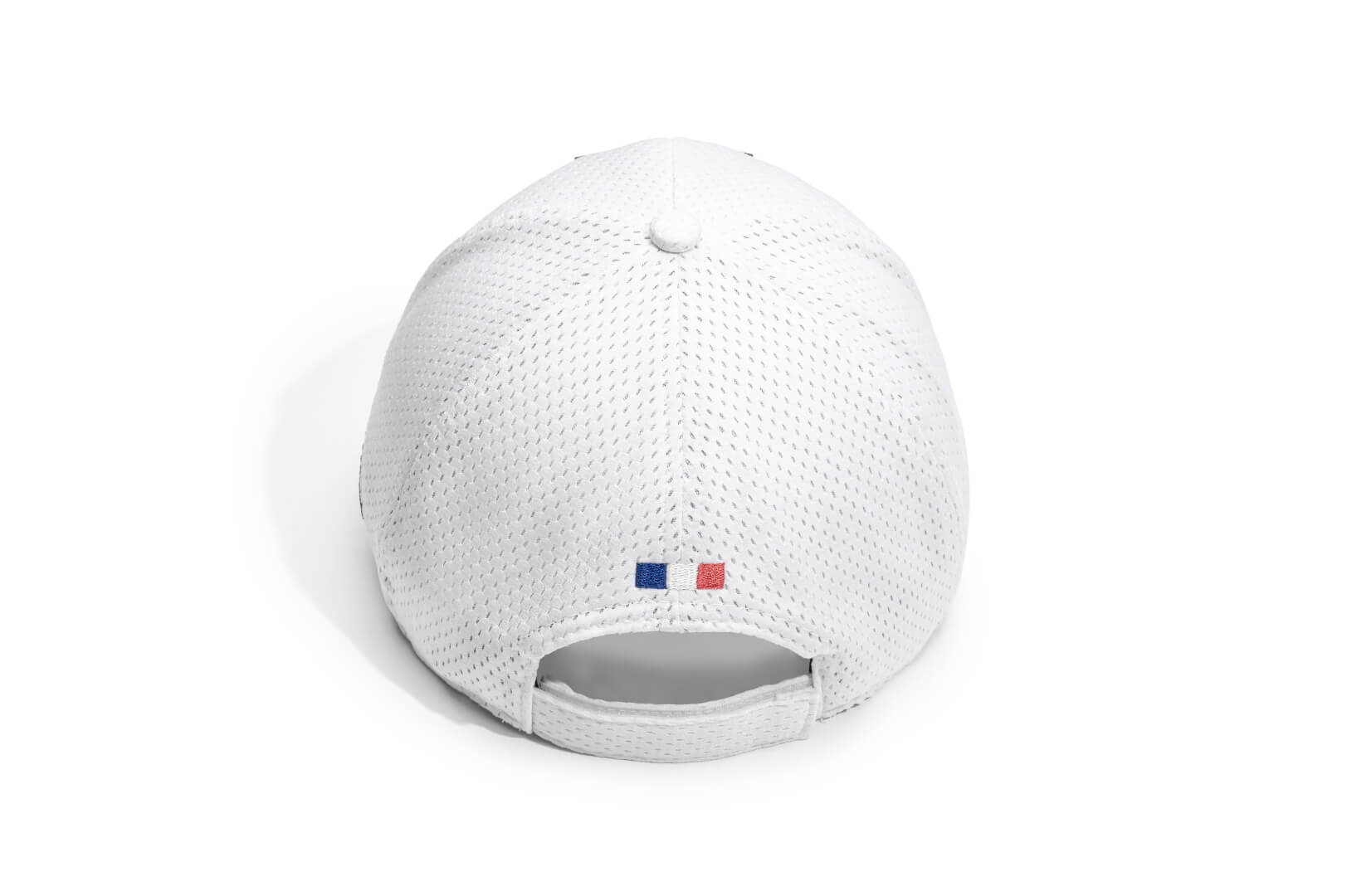 Ciryl Gane x Nobis 5-Panel Adjustable Cap in 5-panel jersey construction, curved brim, adjustable strap at back, tonal black Nobis shield logo attached on crown front, "Bon Gamin" embroidered on the left, and flag of France embroidered on the back, in White
