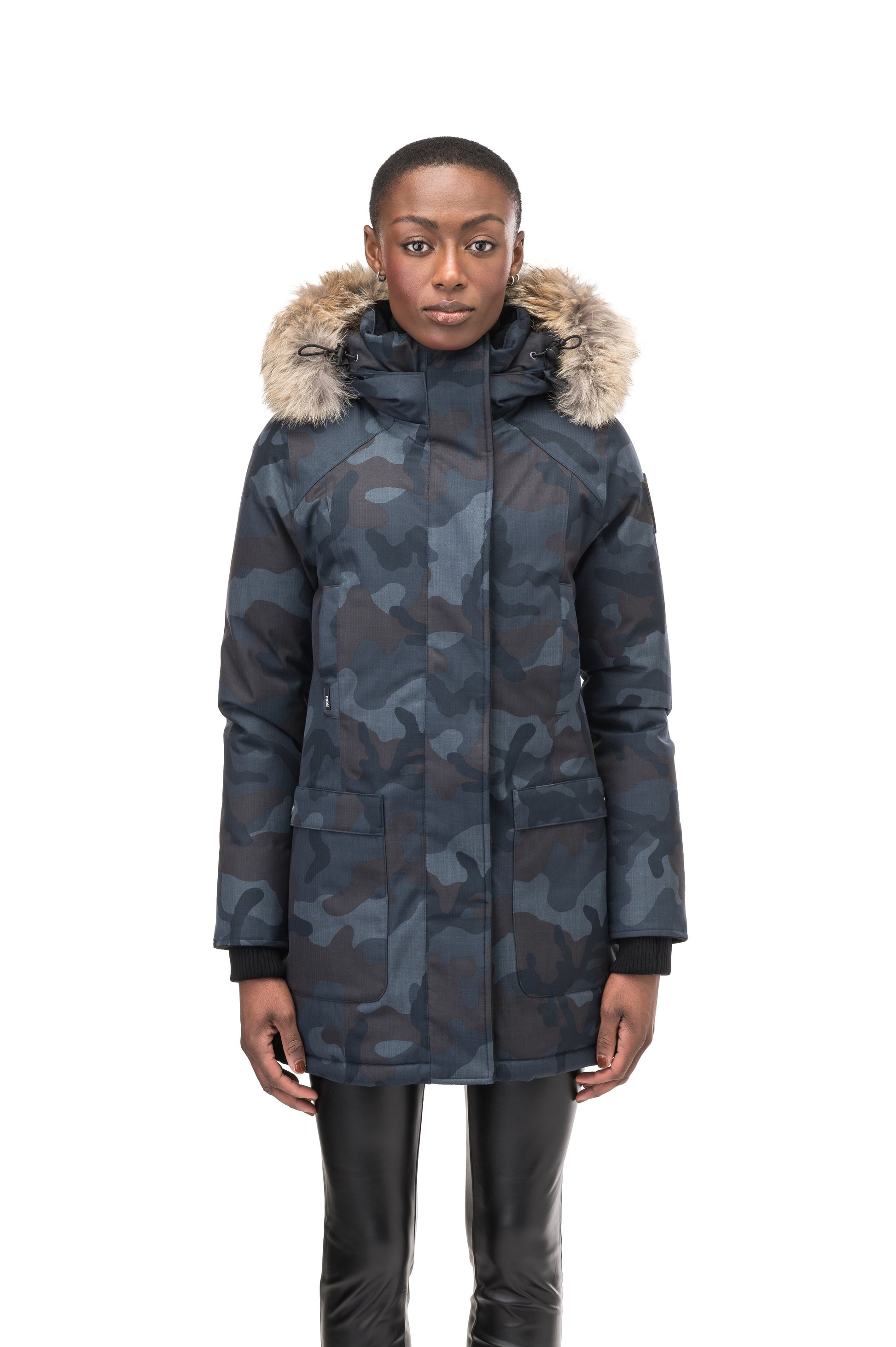 Women's down filled parka that sits just below the hip with a clean look and two hip patch pockets in Navy Camo