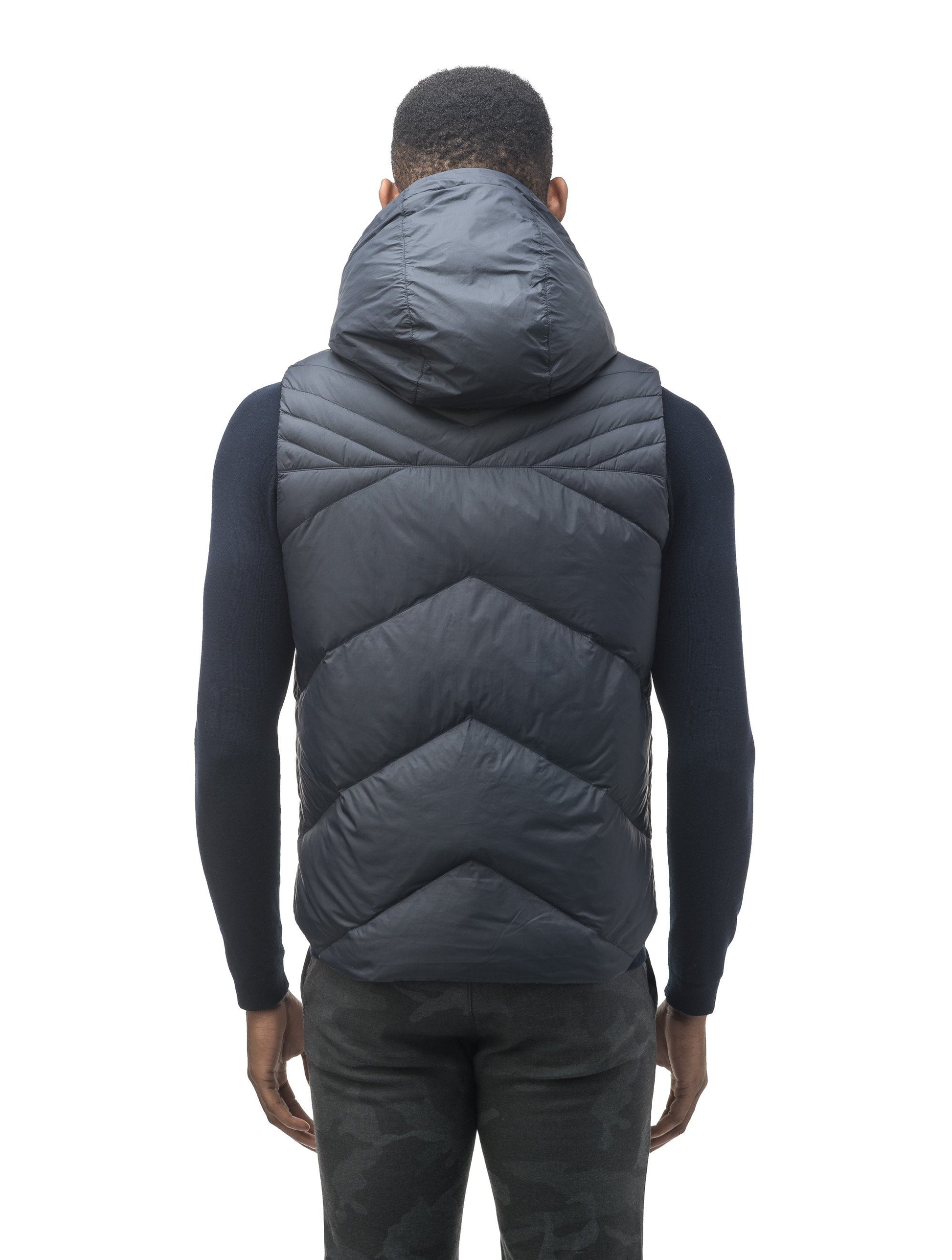 Men's lightweight vest with accents like our removable hood and chevron quilting in Navy