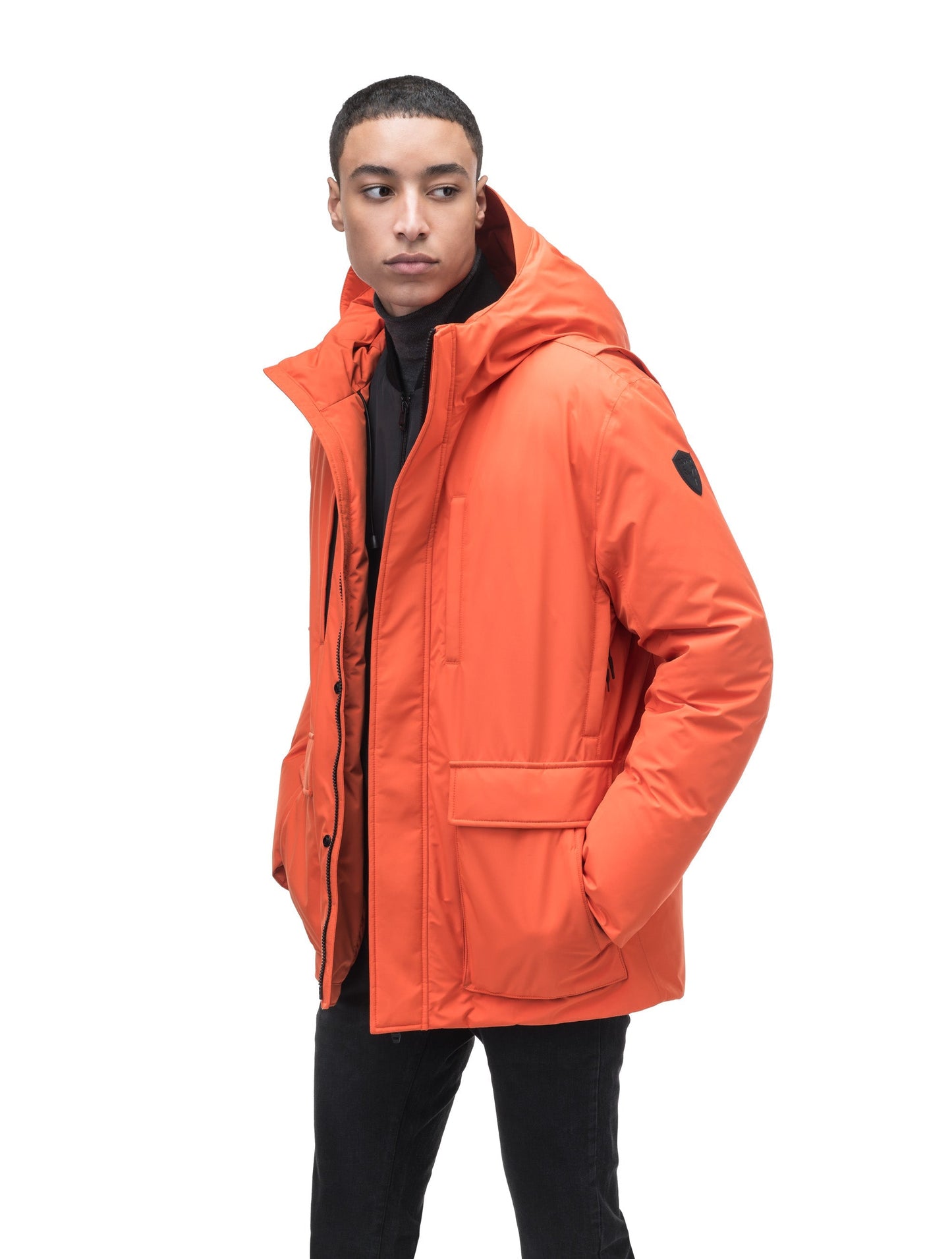 Geo Men's Short Parka in hip length, Canadian duck down insulation, non-removable hood, and two-way zipper, in Terracotta