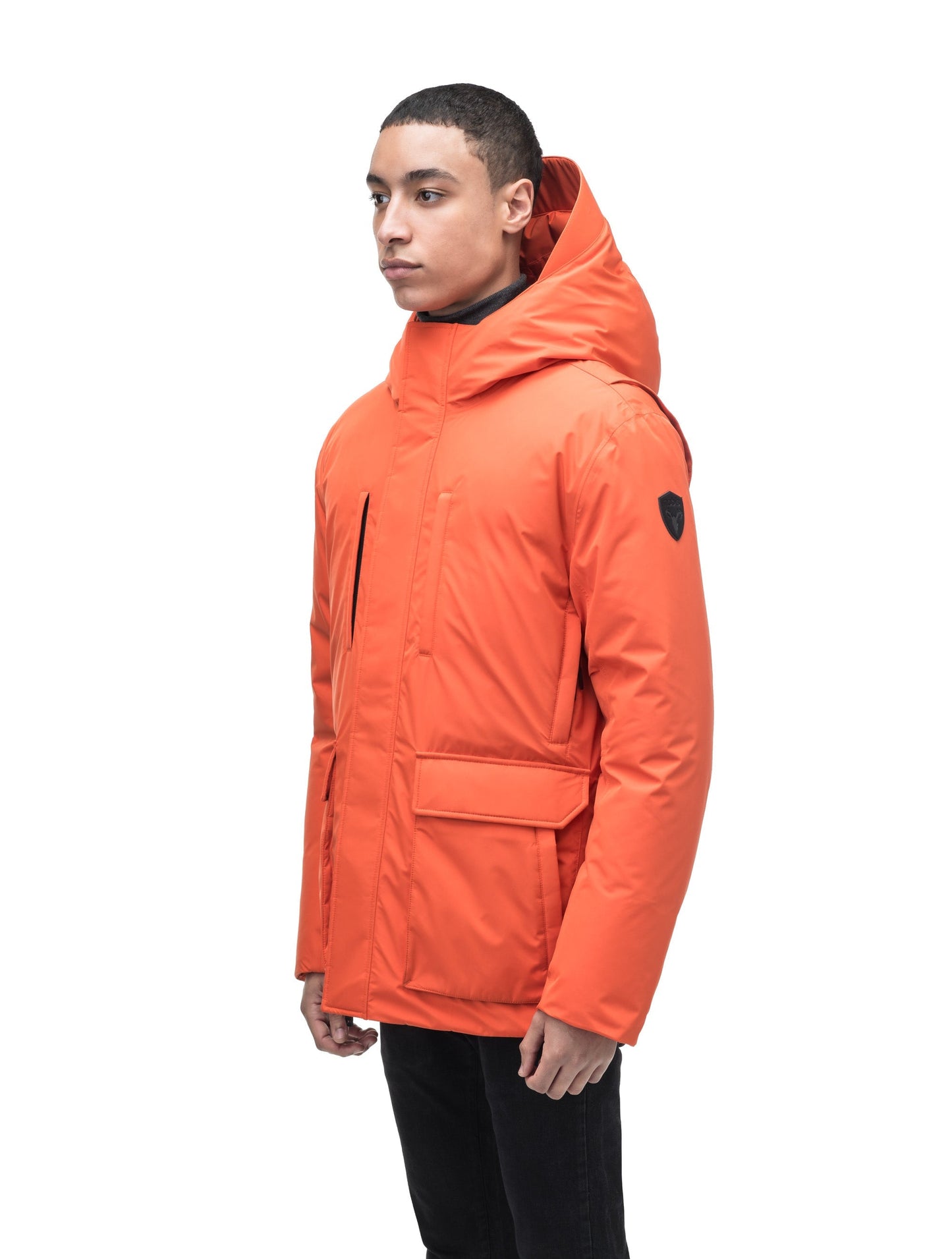 Geo Men's Short Parka in hip length, Canadian duck down insulation, non-removable hood, and two-way zipper, in Terracotta