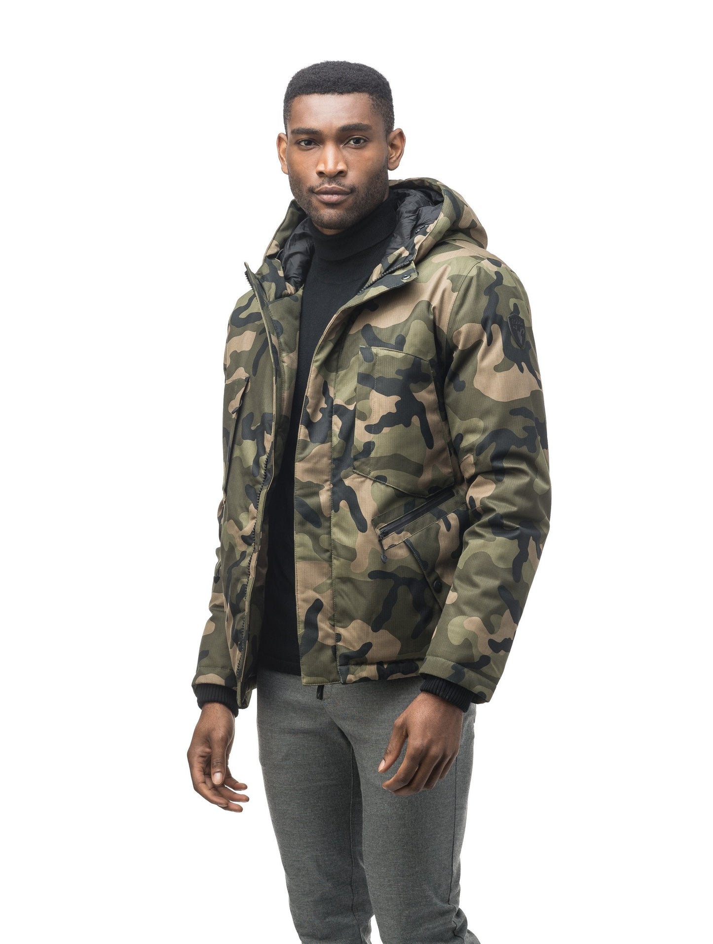 Men's waist length light down coat equipped with six exterior pockets and a hood in Camo