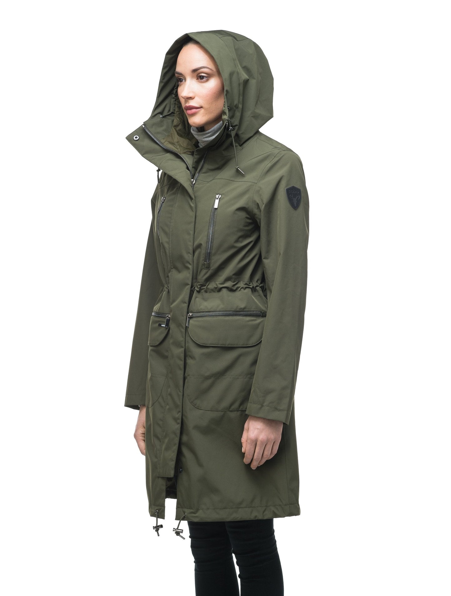 Women's knee length anorak with four front pockets and adjustable cord waist in Fatigue