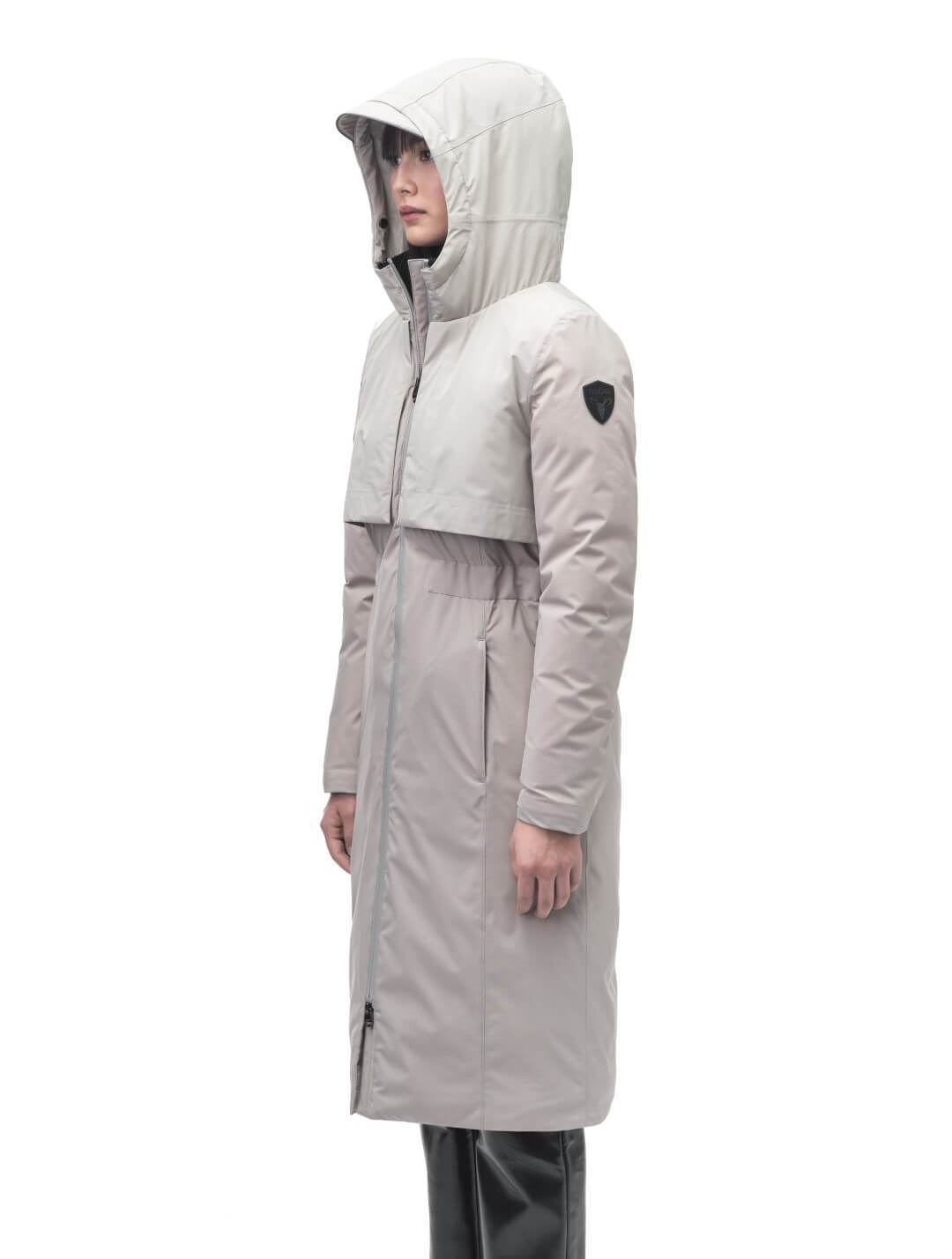 Iris Ladies Long Parka in below the knee length, Canadian duck down insulation, non-removable hood, and two-way zipper, in Clay