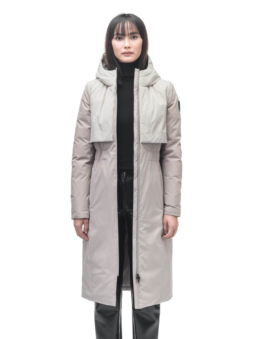 Iris Ladies Long Parka in below the knee length, Canadian duck down insulation, non-removable hood, and two-way zipper, in Clay