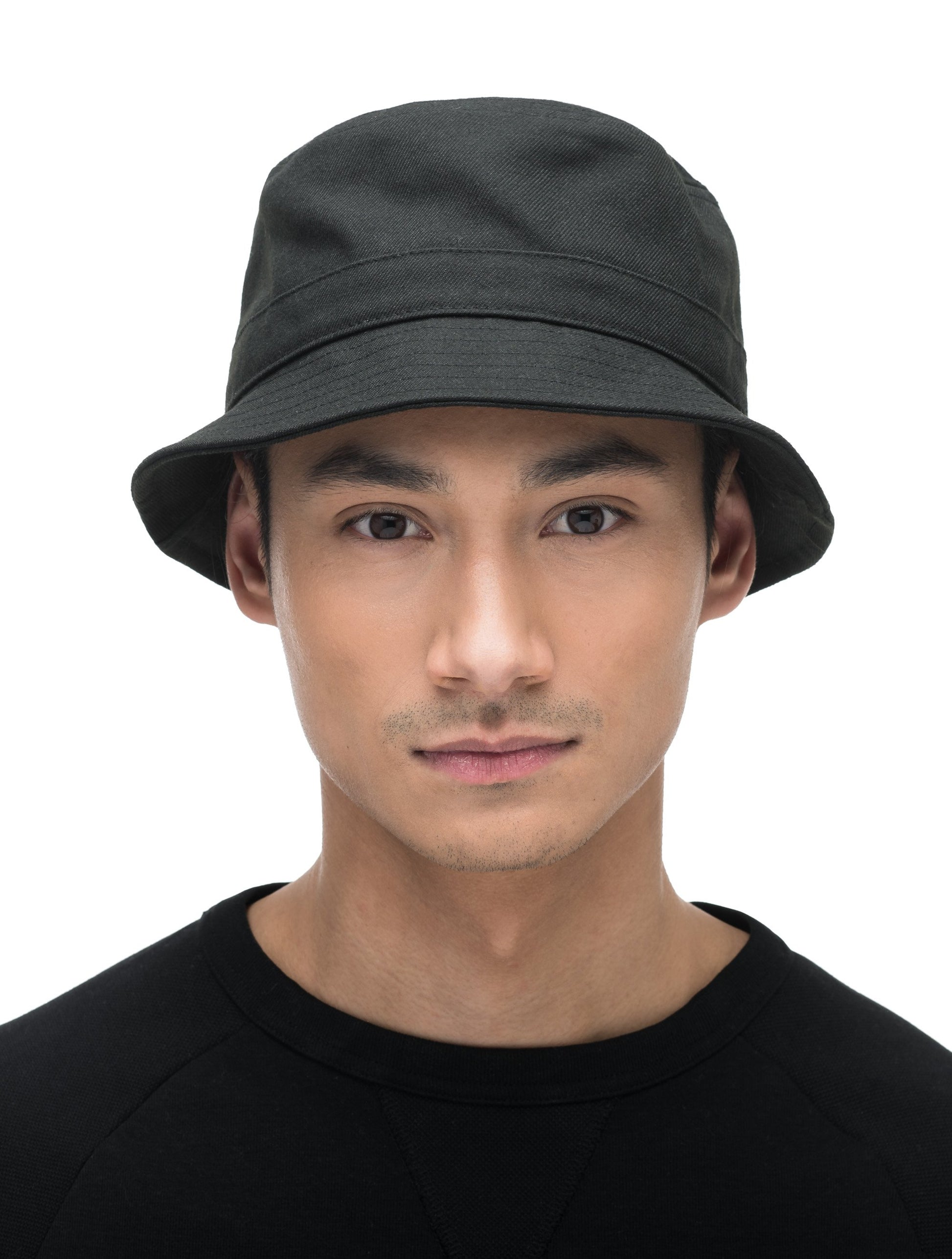 Unisex bucket hat with flat crown top and stitching detail on brim in Black