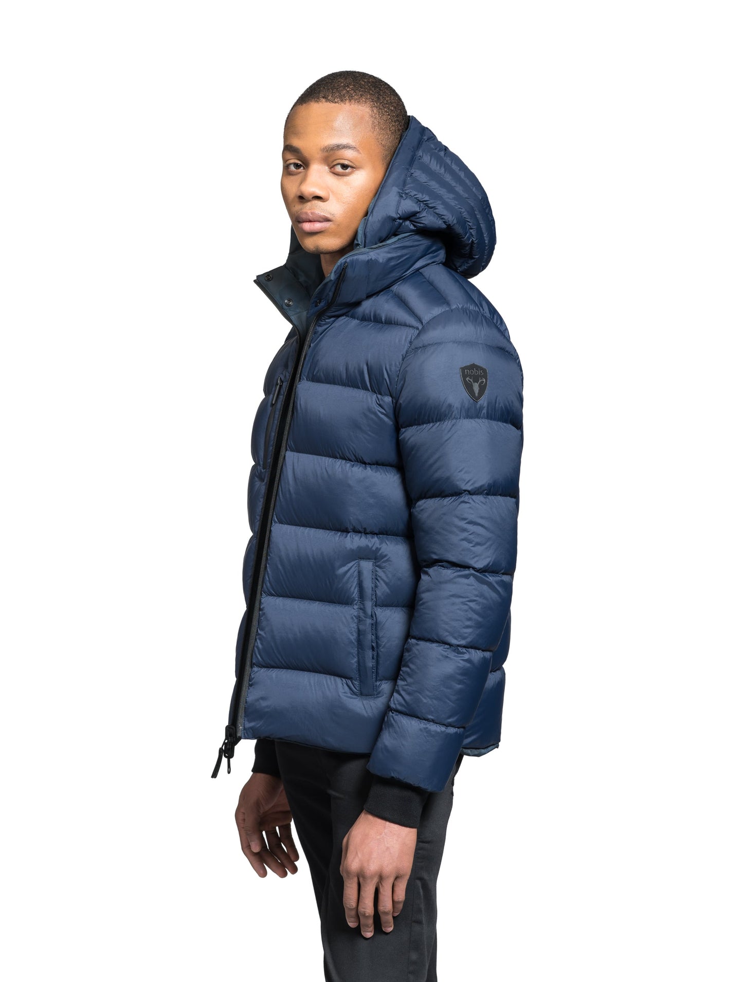 Hip length, reversible men's down filled jacket with removable hood in Navy Camo