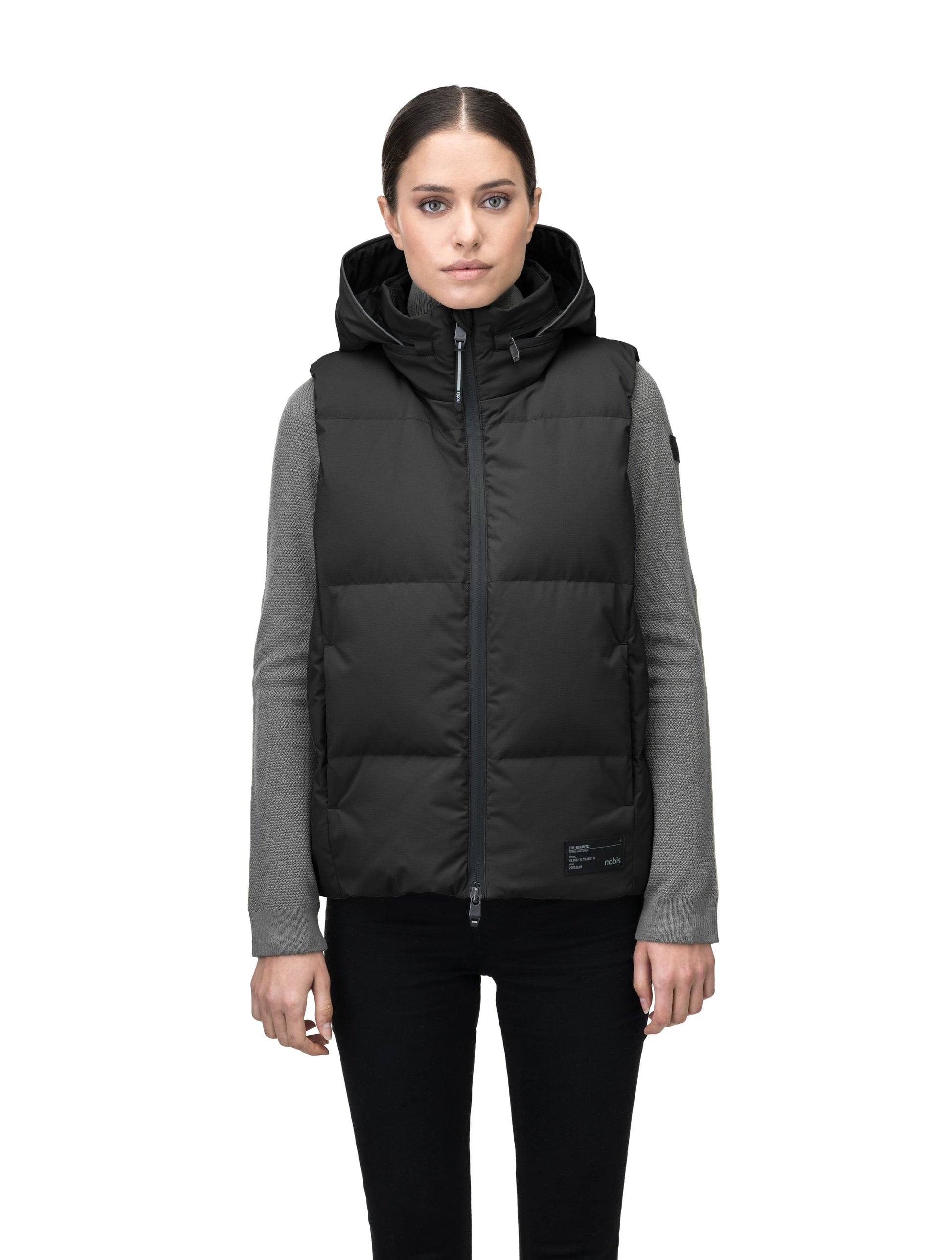 Oren Ladies Performance Vest in hip length, Durable Stretch Ripstop and 3-Ply Micro Denier fabrication, Premium Canadian White Duck Down insulation, tuck-away waterproof hood, and two-way centre front zipper, in Black