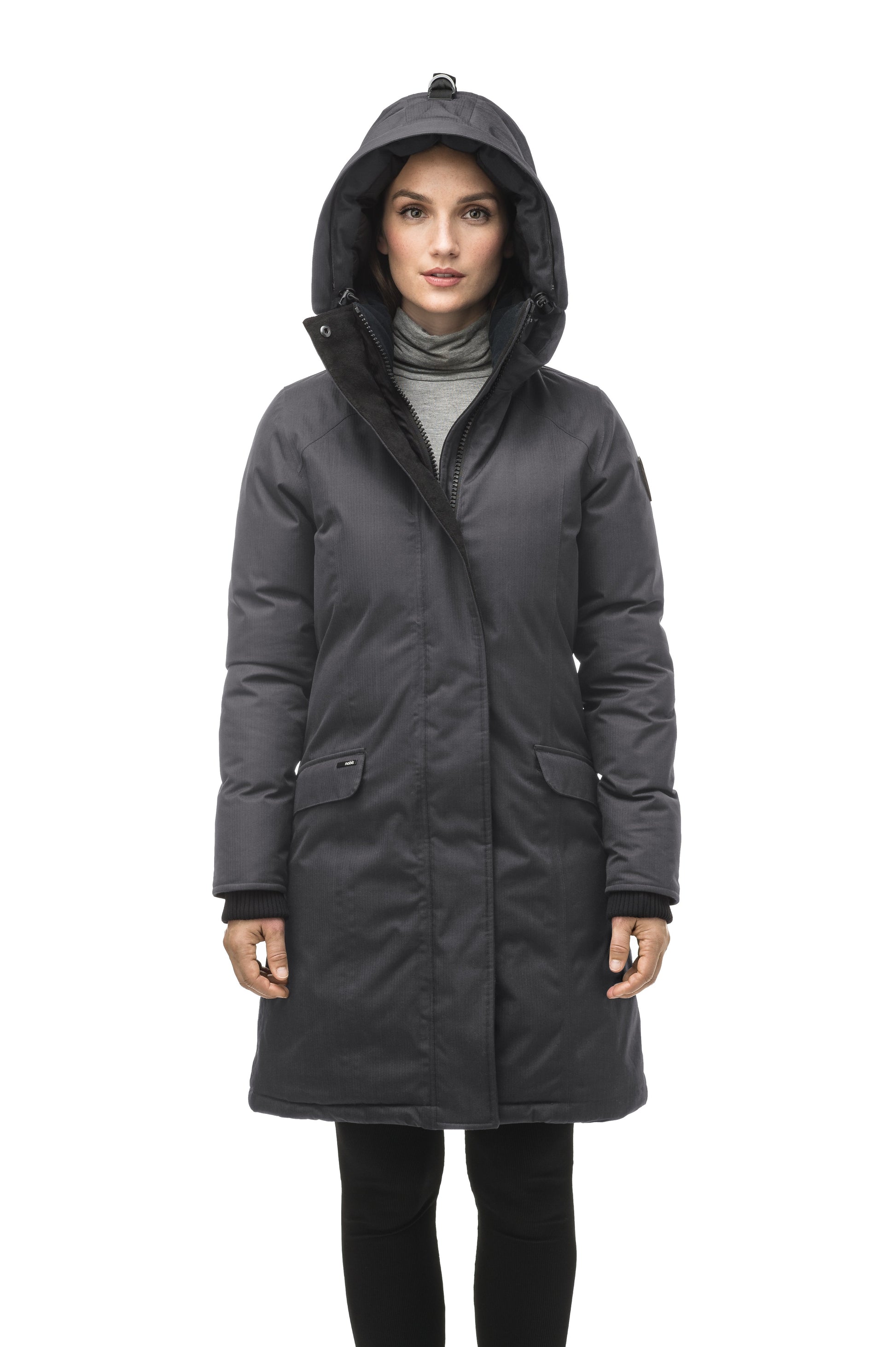 Rebecca Women's Parka in knee length, Canadian duck down insulation, two-way zipper with magnetic front placket, non-removable hood with removable coyote fur trim, in Steel Grey