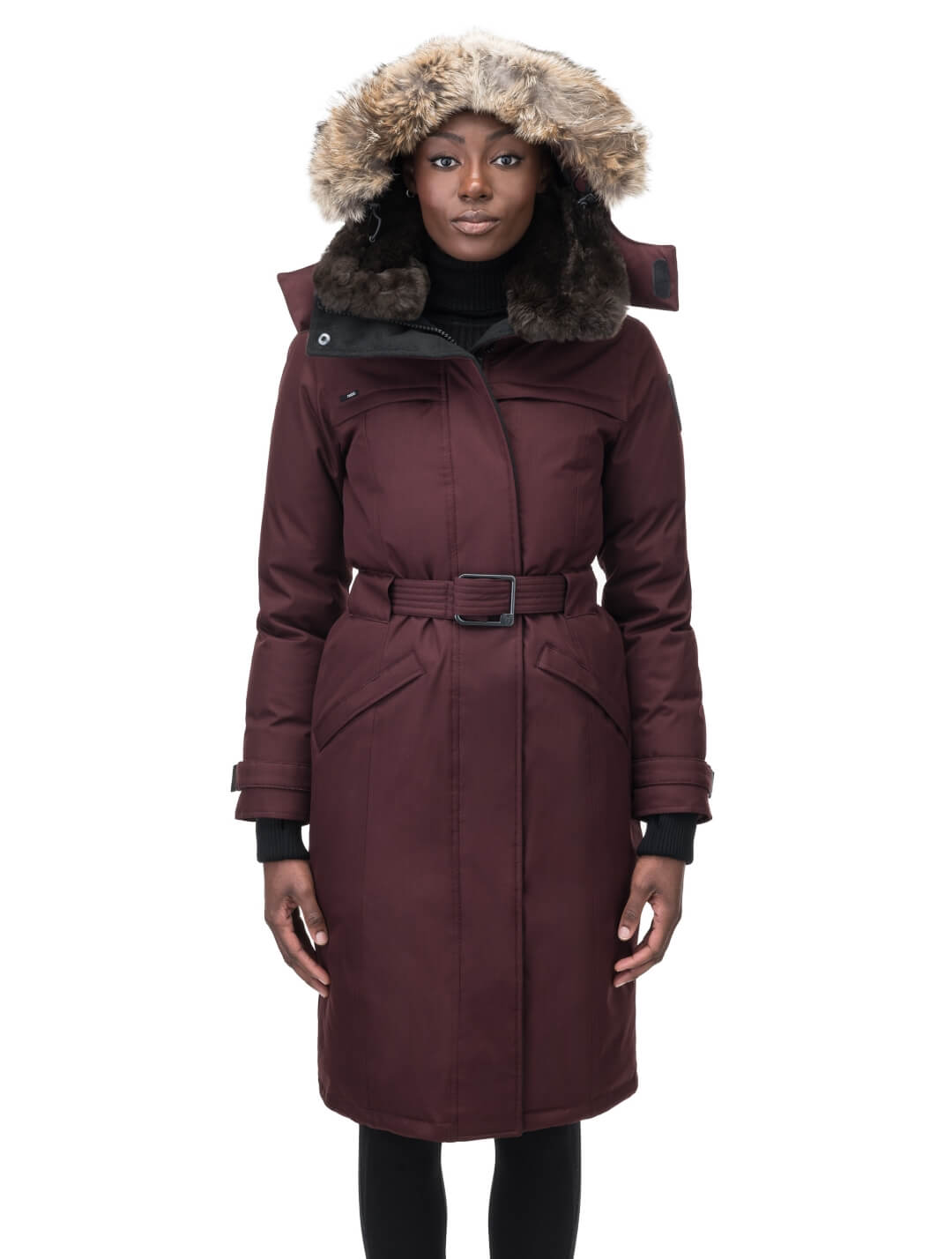 Women's knee length down filled parka with a belted waist and fully removable Coyote and Rex Rabbit fur ruffs in Merlot