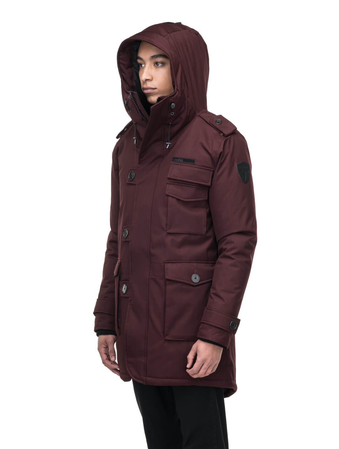 Men's down filled parka with faux button magnet closures and fur free hood with a fishtail hemline in Merlot