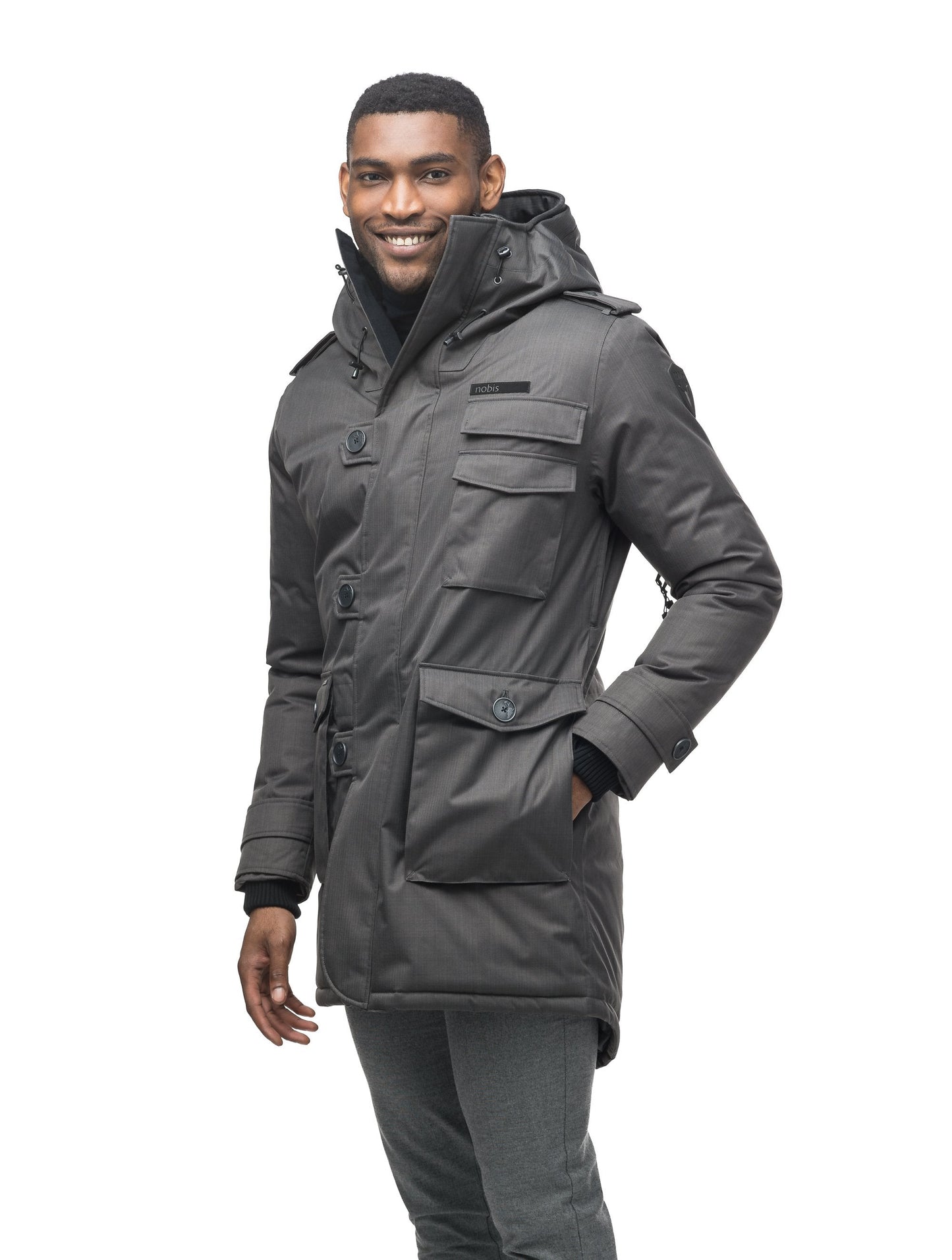 Men's down filled parka with faux button magnet closures and fur free hood with a fishtail hemline in Steel Grey