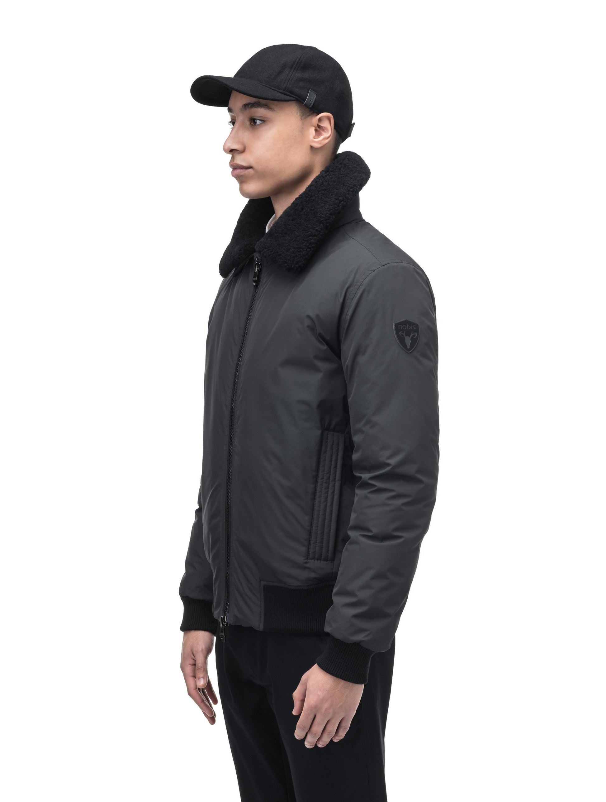 Sonar Men's Aviator Jacket in hip length, Canadian duck down insulation, removable shearling collar with hidden tuckable hood, and two-way front zipper, in Black