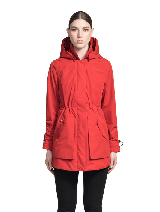 Women's thigh length raincoat with collar and non-removable hood in Vermillion
