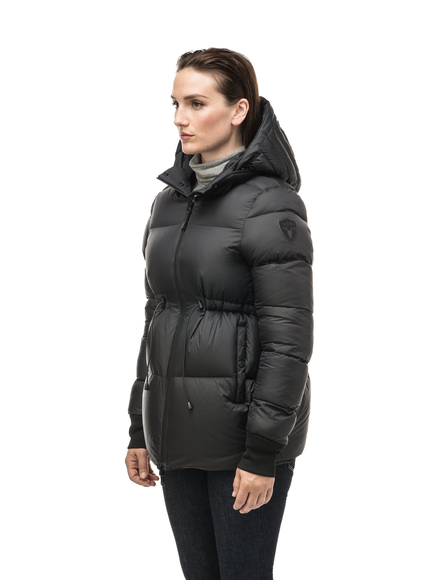 Hip length, reversible women's down filled jacket with waterproof exposed zipper in Black