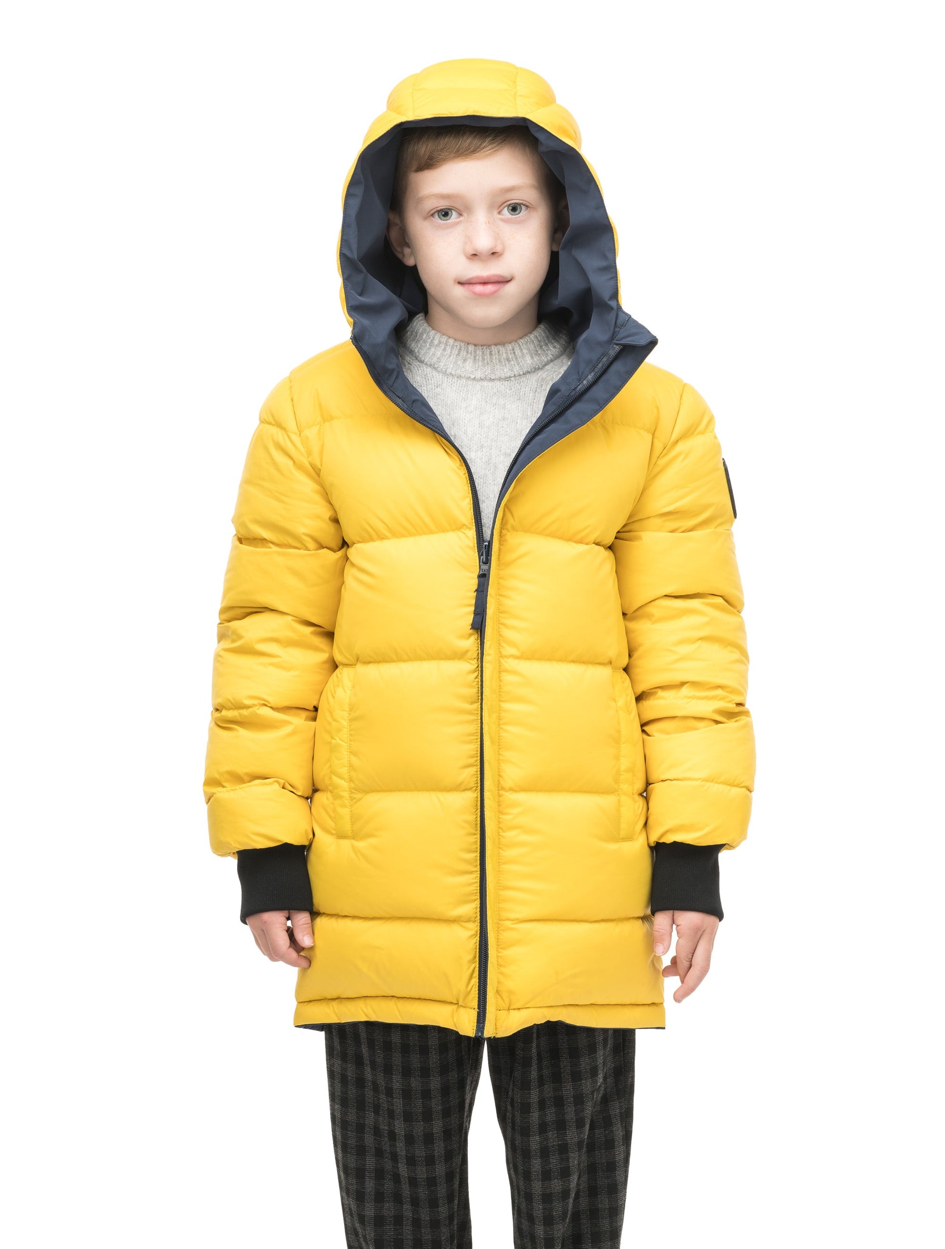 Kids' reversible knee length, down filled parka with waterproof finish in Marine/Citron